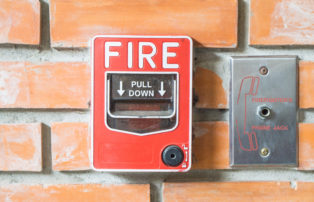 Fire Alarm on a brick wall